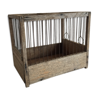 Old bird cage made of wood and steel