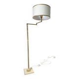 Floor lamp with articulated arm in brass-plated metal