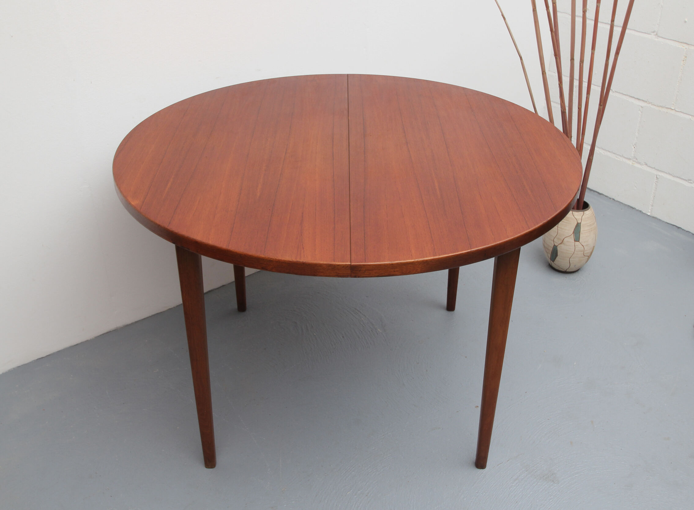 1960s extendible  round dining table in teak
