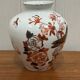 Vase decorated with birds and butterflies