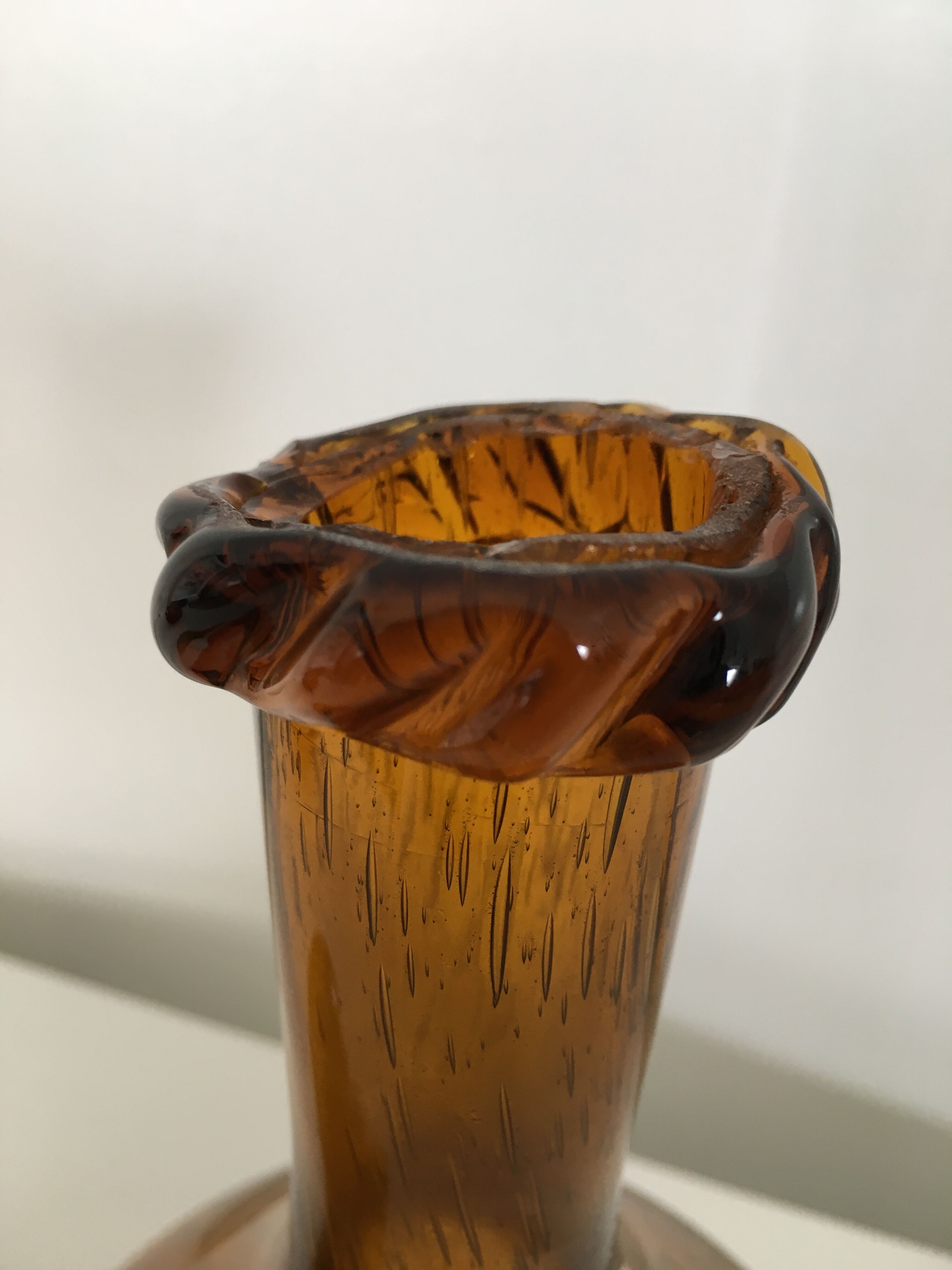 Biot blown glass amber bottle