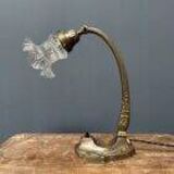 French art nouveau table lamp with transparent glass shade