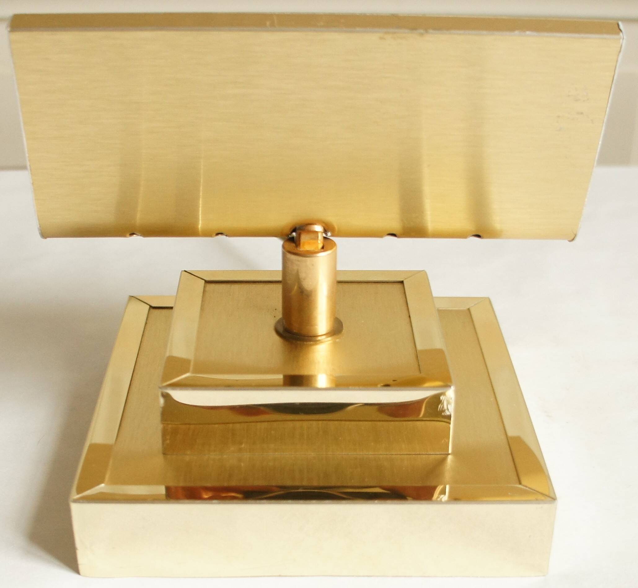 Hollywood Regency articulated lamp/wall lamp in golden brass