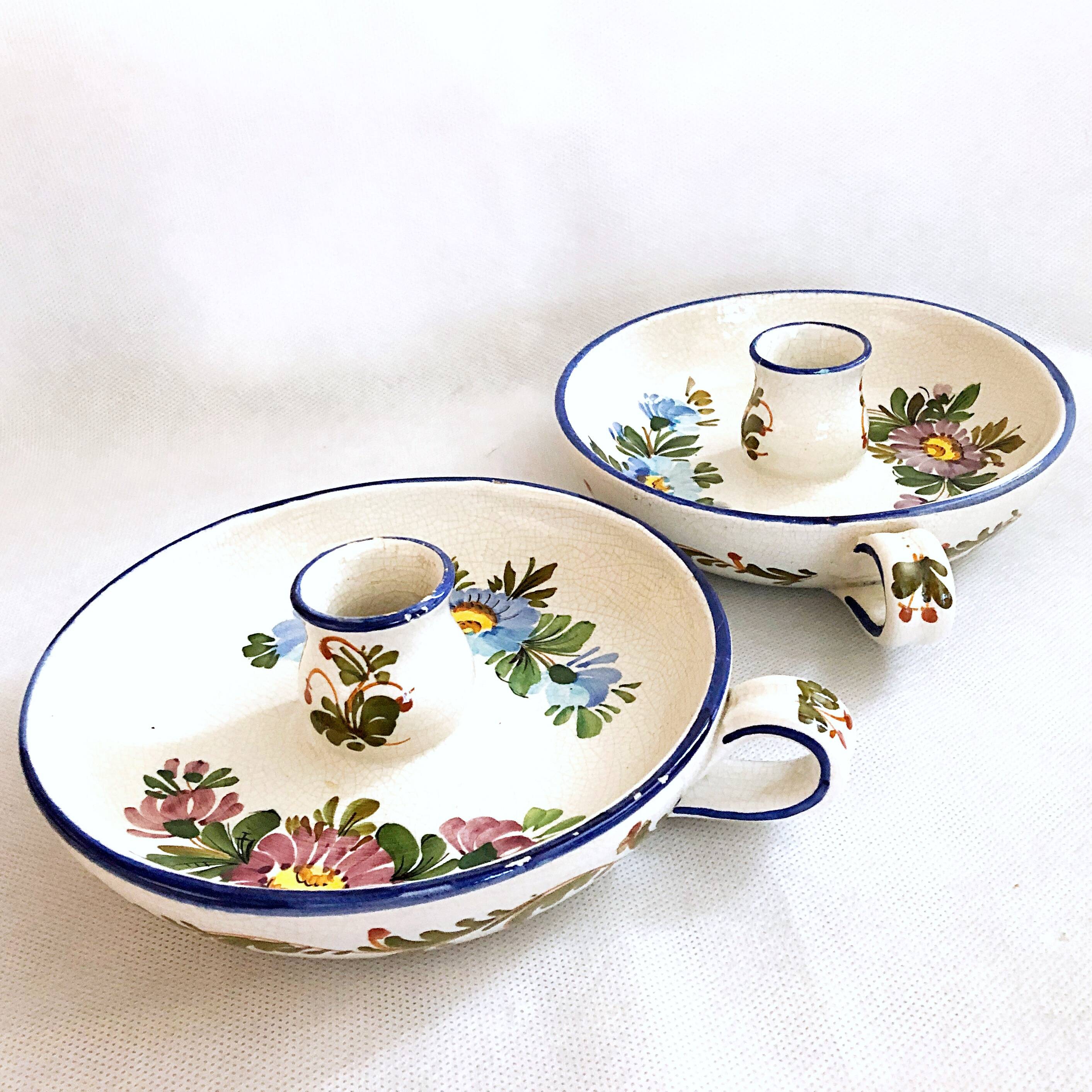 Pair of handmade cracked earthenware hand candlesticks signed Bassano Italy