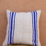 Coussin rayé bleu et blanc en laine