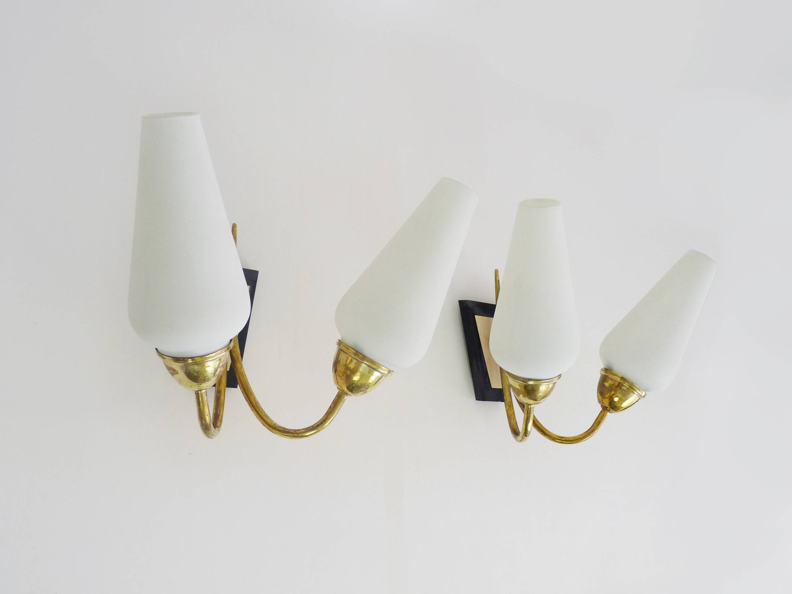 Pair of brass wall lights with double white tube lights. 70s