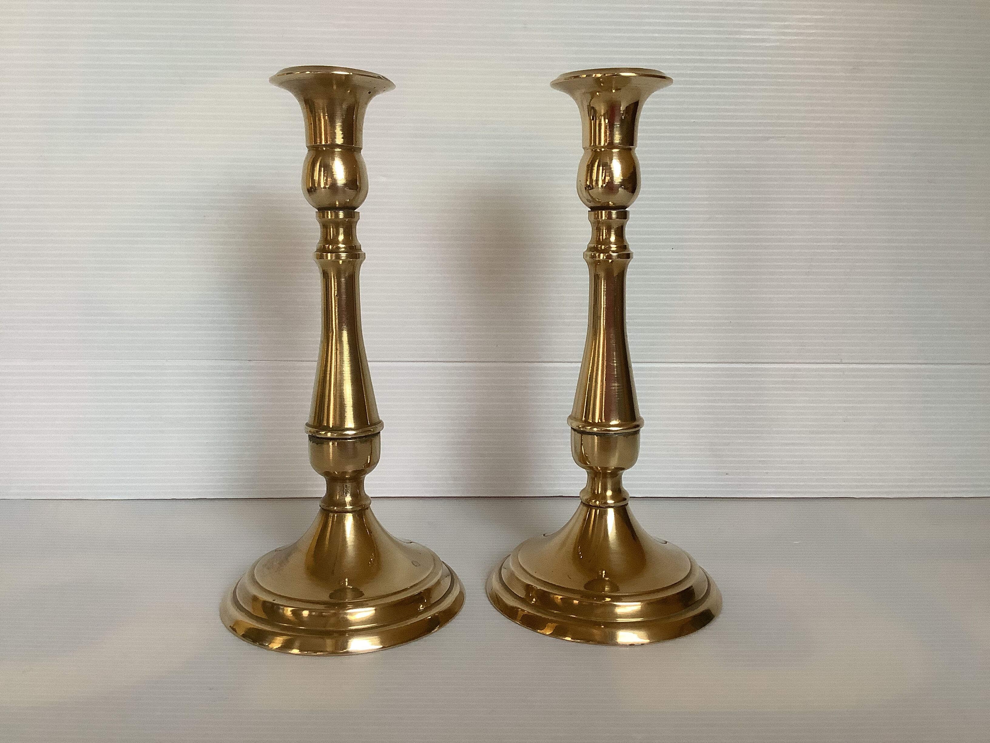 Pair of brass candle holders