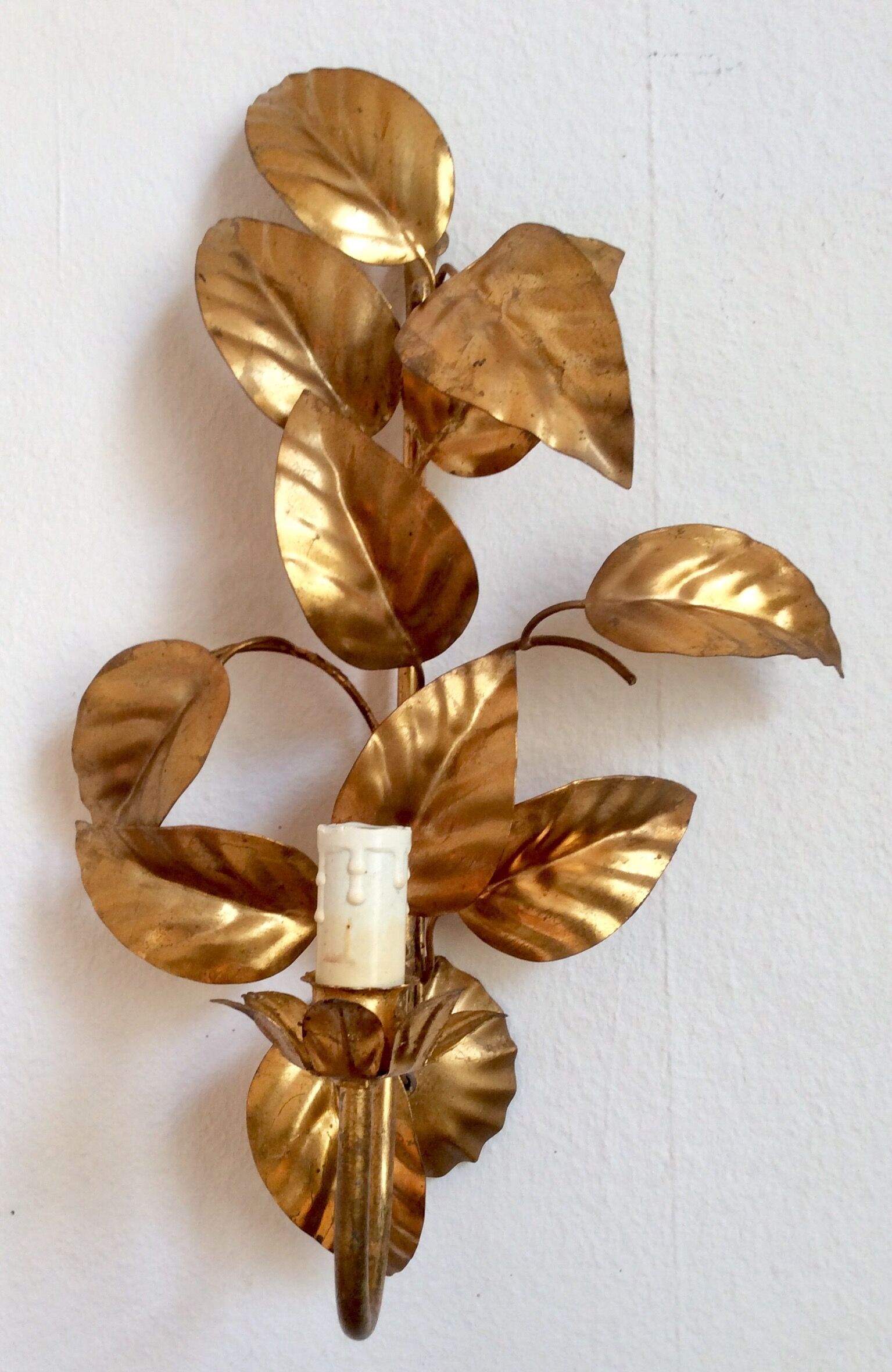 Apply gold metal sheets, Hans Kolg