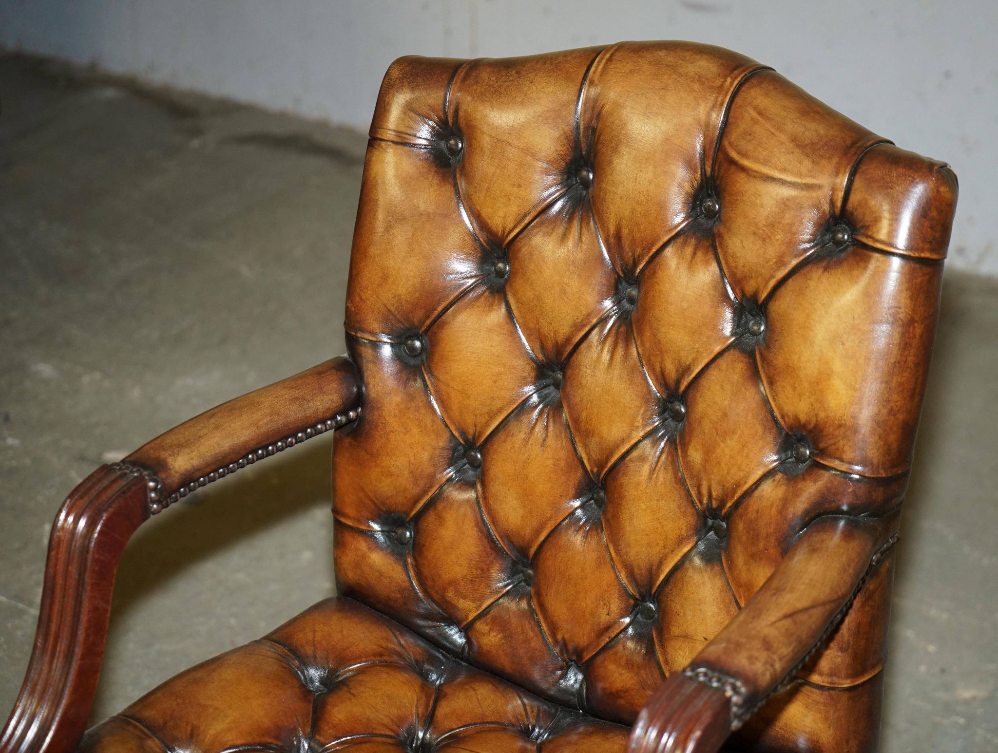 Restored leather captain's Chesterfield chair