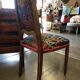 Art Nouveau chair with floral fabric and carved wood