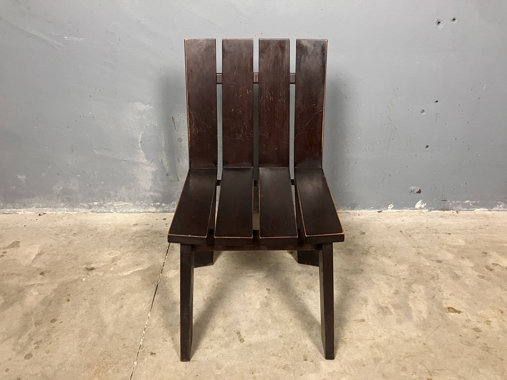 Brutalist and modernist dining chairs from the 1970s in architectural brown wood.