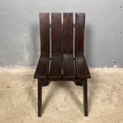 Brutalist and modernist dining chairs from the 1970s in architectural brown wood.