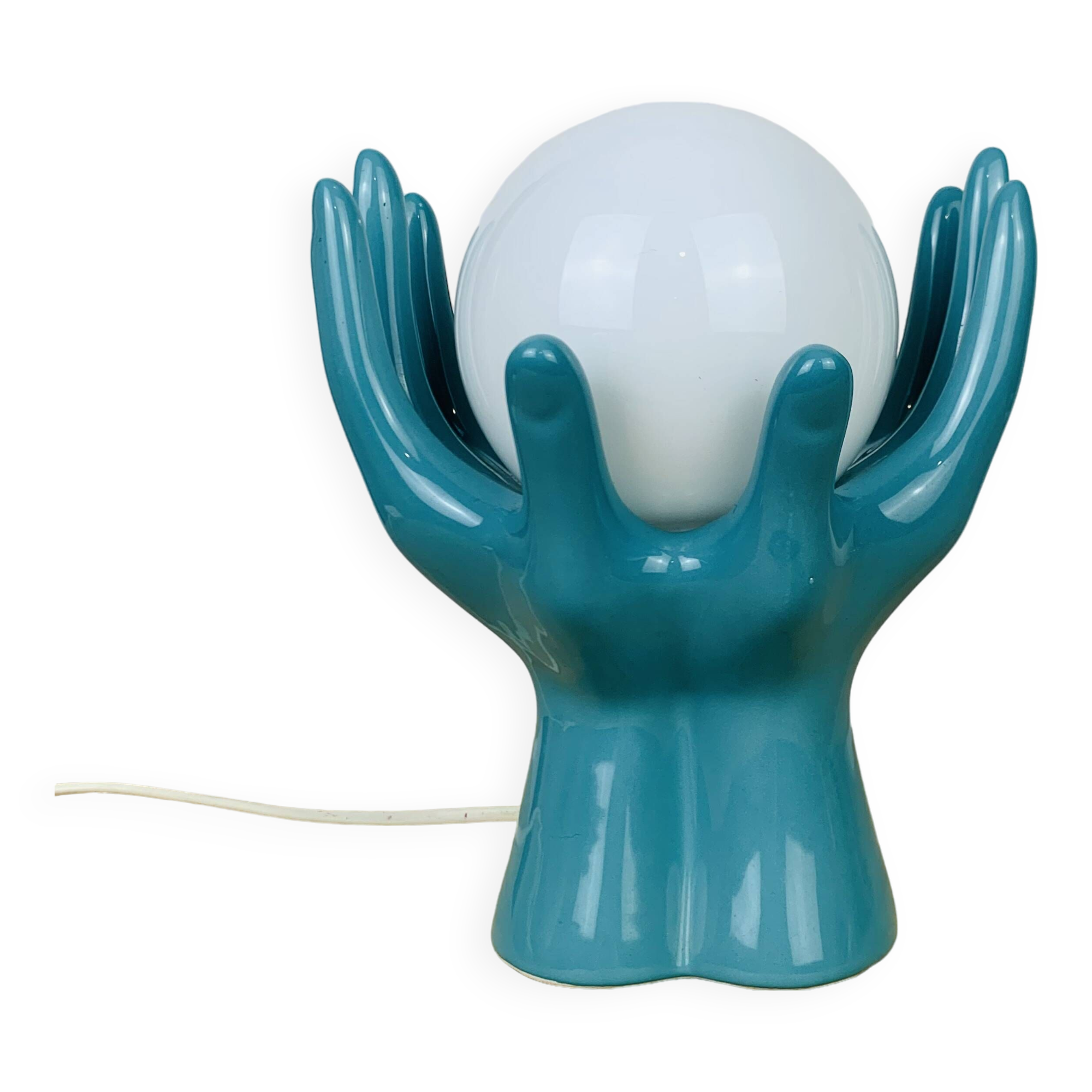 Blue ceramic hands lamp and glass globe