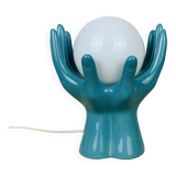 Blue ceramic hands lamp and glass globe