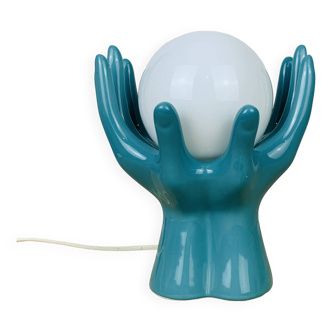 Blue ceramic hands lamp and glass globe