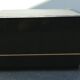 Designer coffee table in black lacquered wood and vintage brass