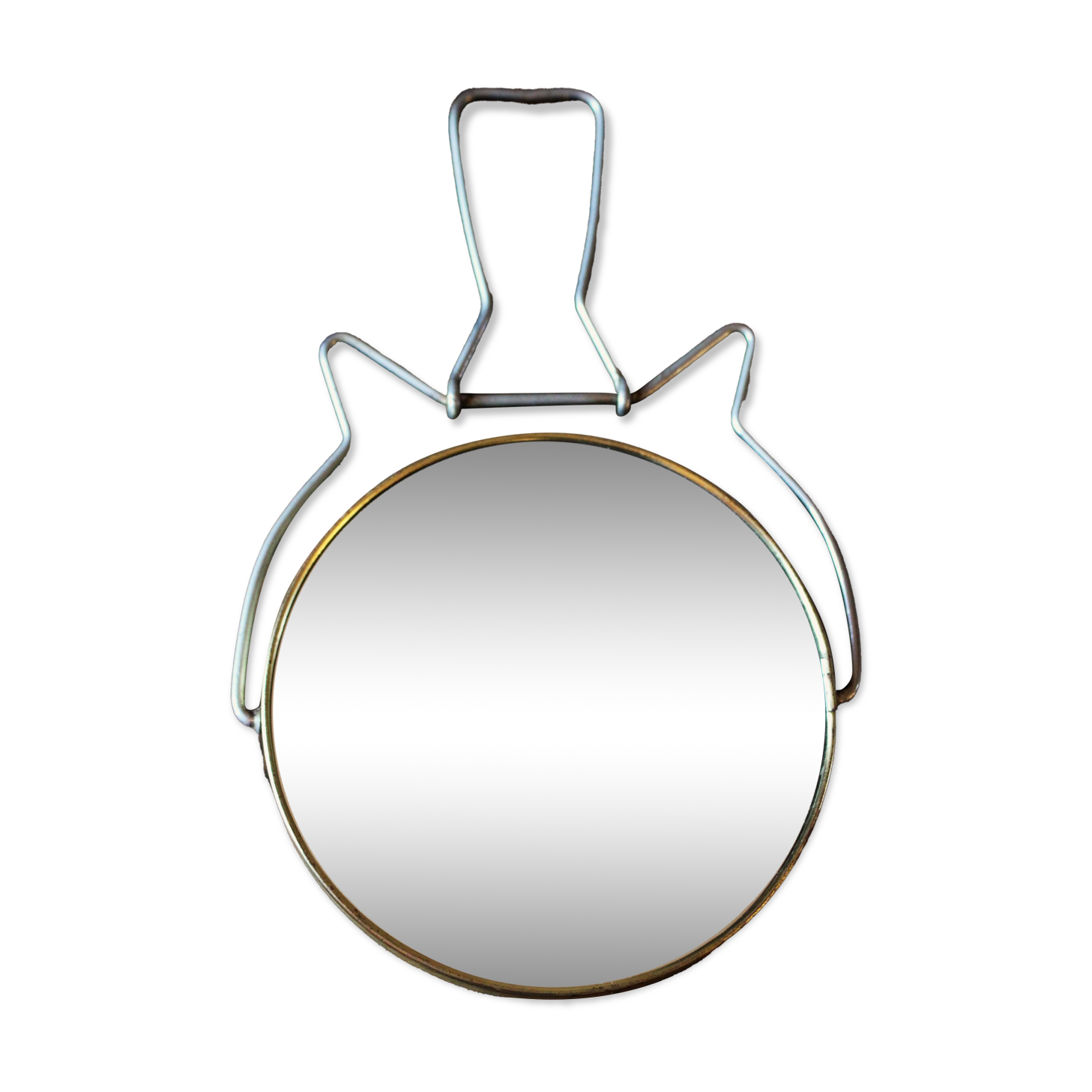 Antique round barber mirror in gilded metal