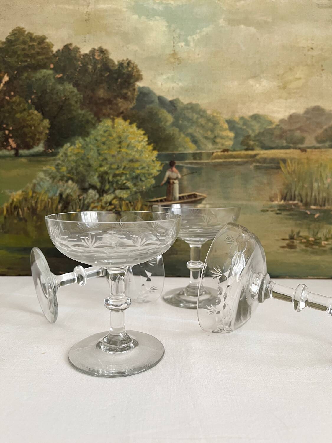 4 antique champagne glasses in engraved glass decor