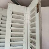 Louvered wooden shutter