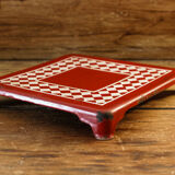 Checkered trivet, enamelled sheet metal