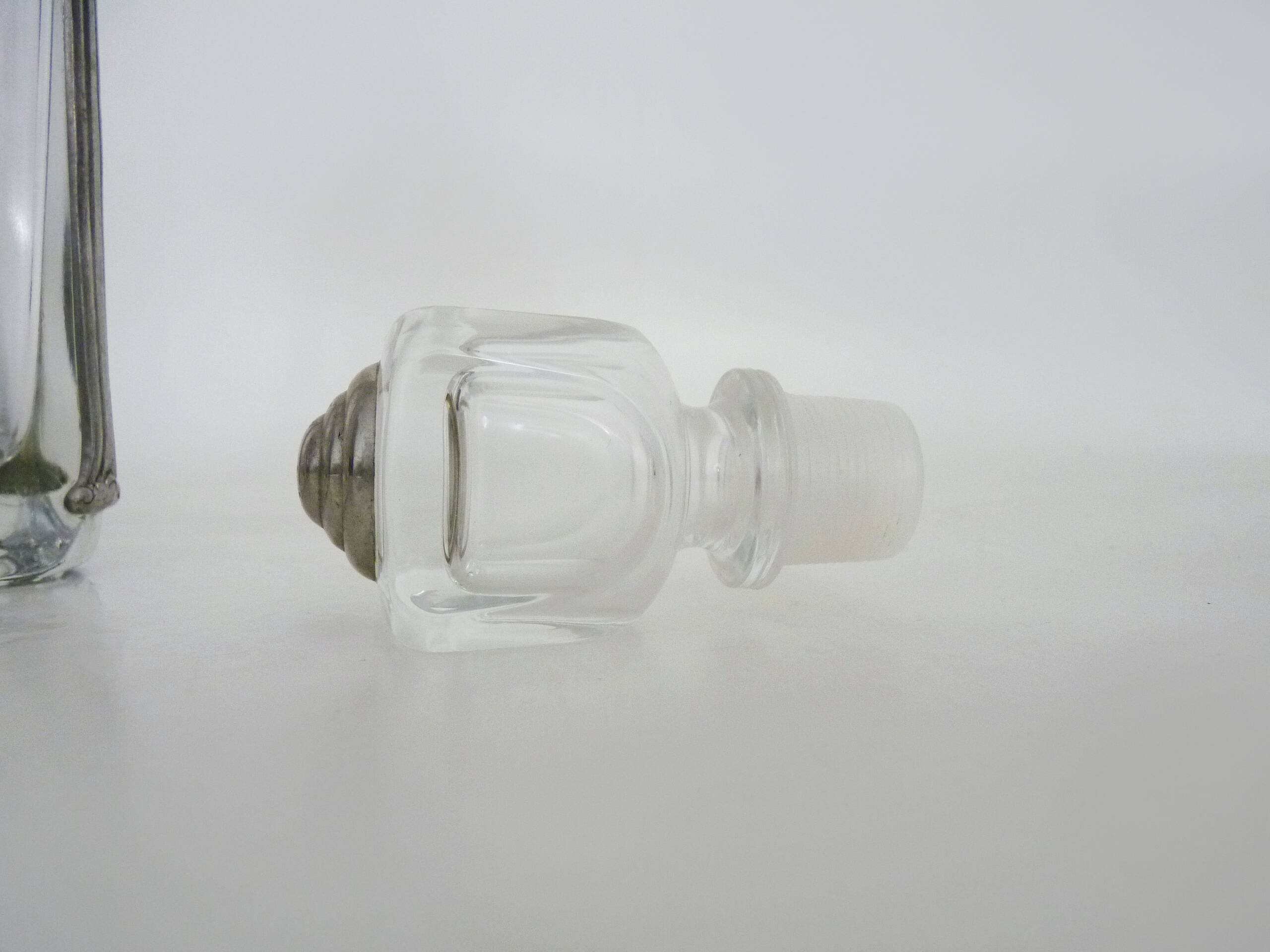 Magnificent crystal and silver-plated metal carafe bottle.