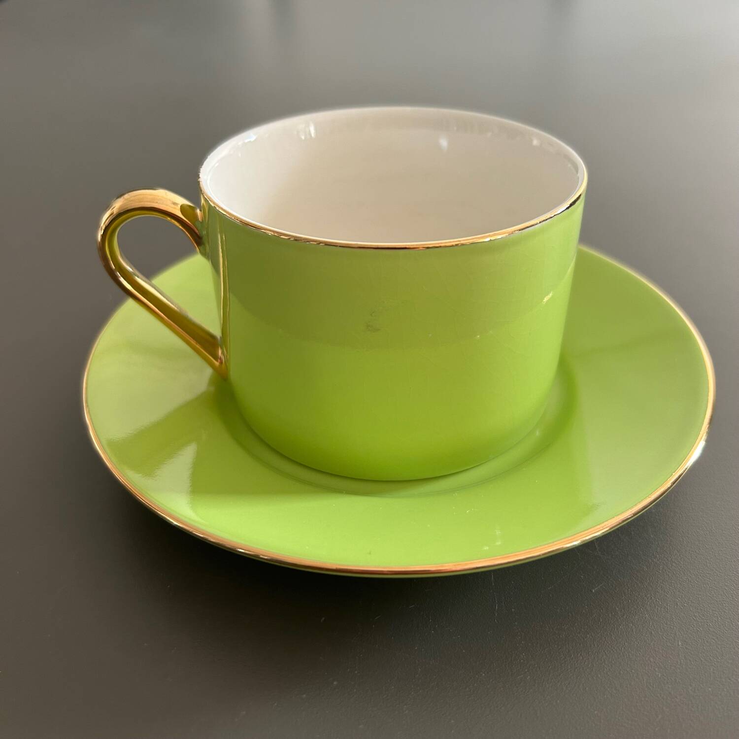 Lime green cup and saucer