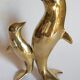 Vintage solid brass dolphins