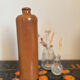 Vintage MKT ocher stoneware bottle