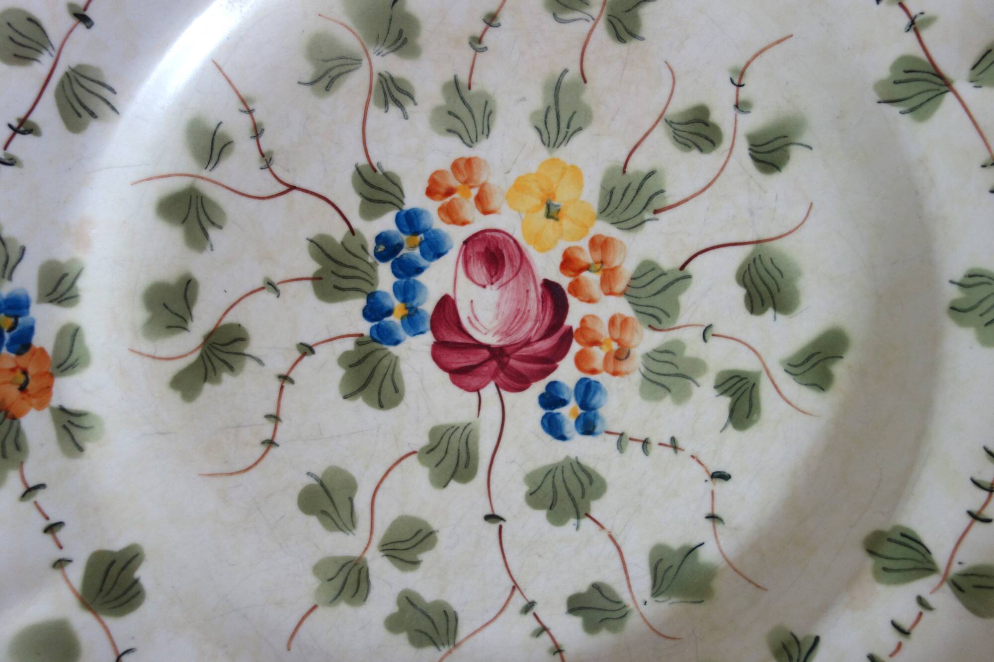 12 old Longchamp flat plates with floral decoration