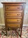 Louis XVI style molded and carved walnut chest of drawers