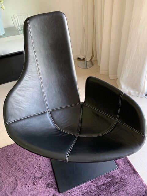 Moroso Fjord armchair with its pouf, design Patricia Urquiola 2002, steel and smooth black leather