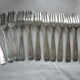 12 forks a silver metal cake