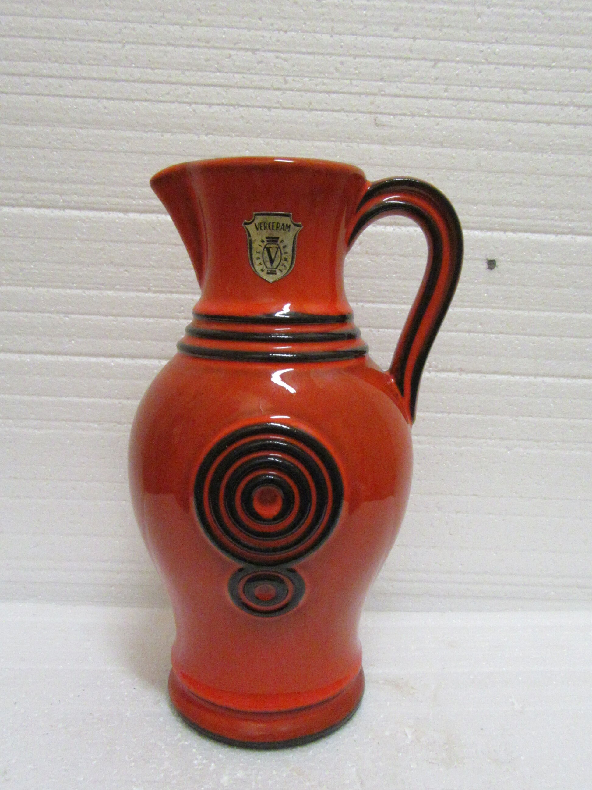 Orange and black pitcher Verceram