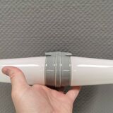 Bathroom lamp with light gray ceramic base,  and milky white opal glass.