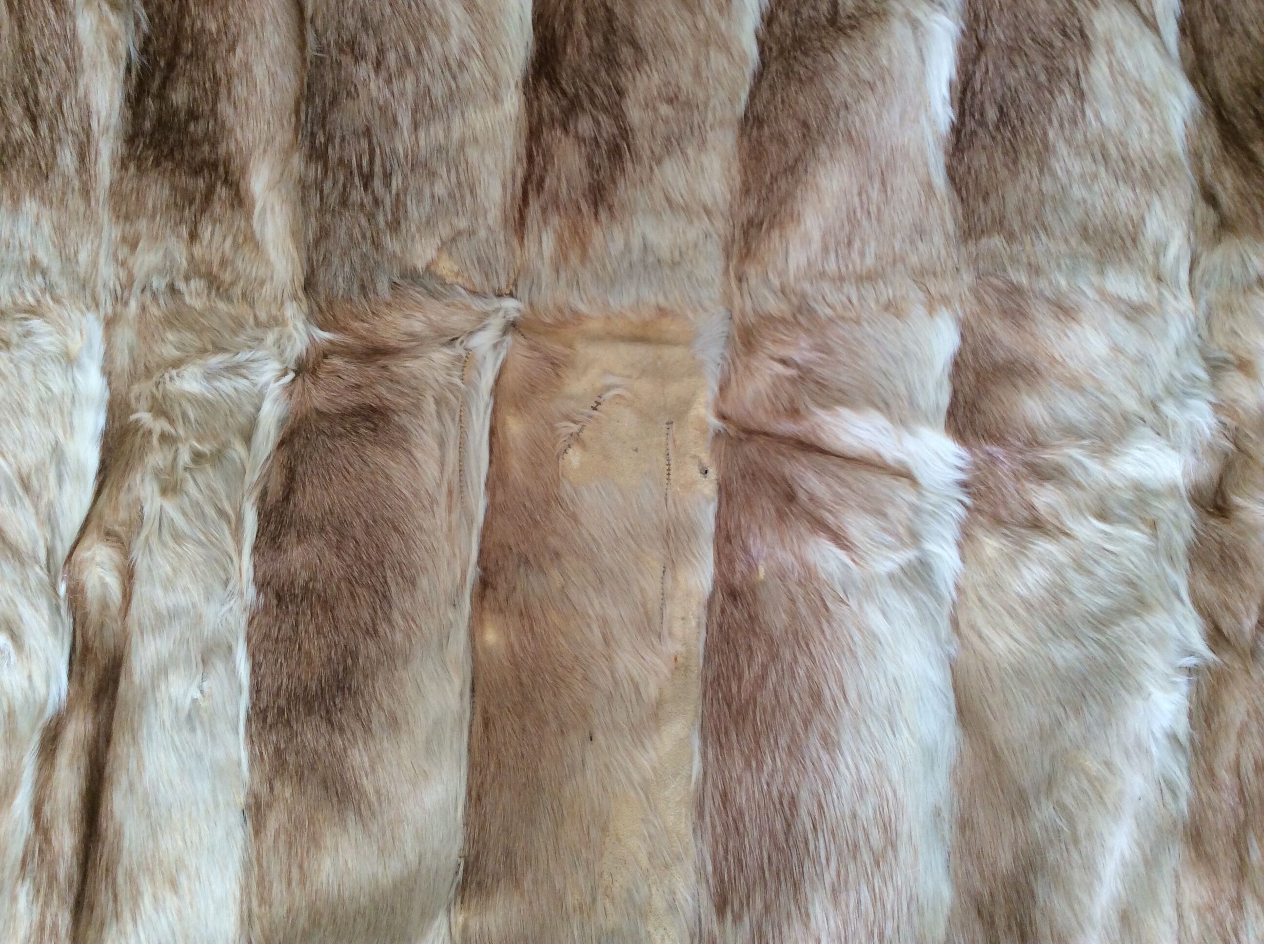 Rabbit skin rug, 200x225cm.