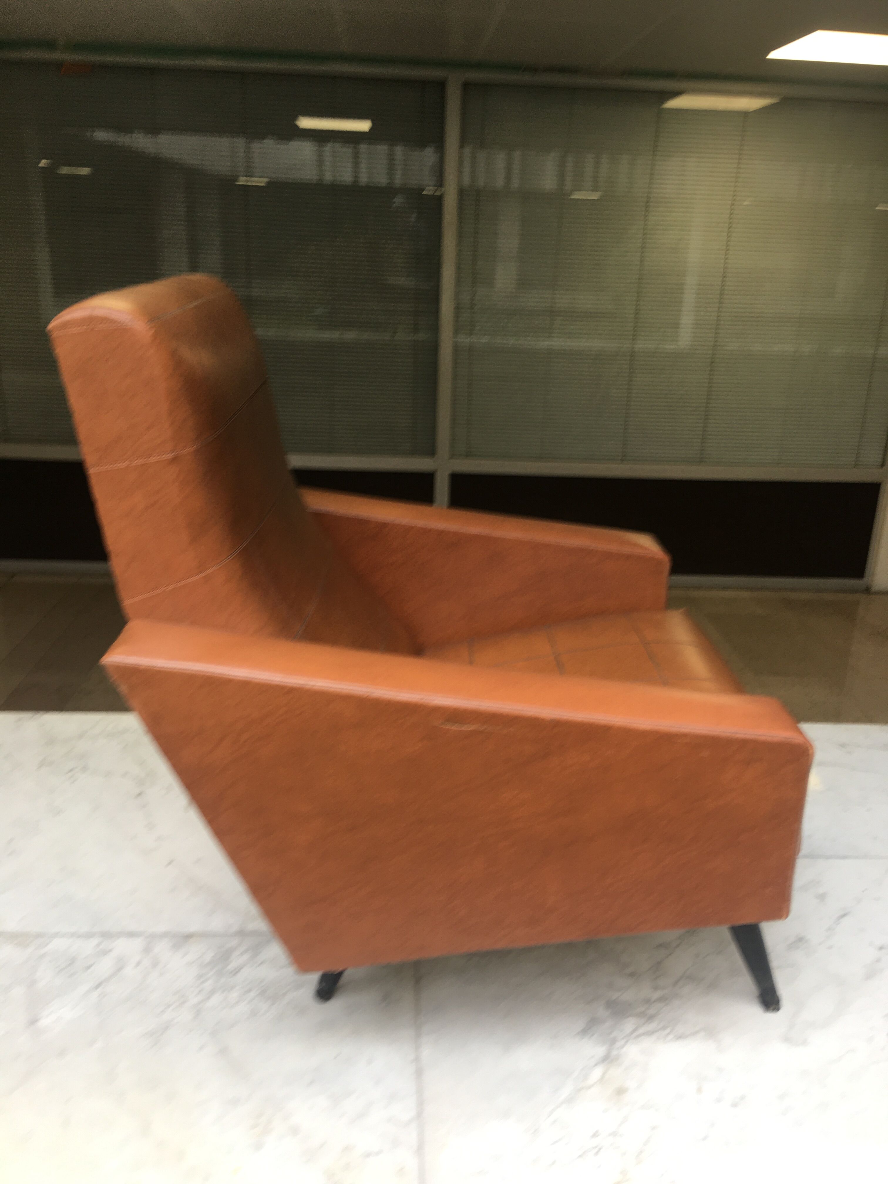 Brown skai armchair