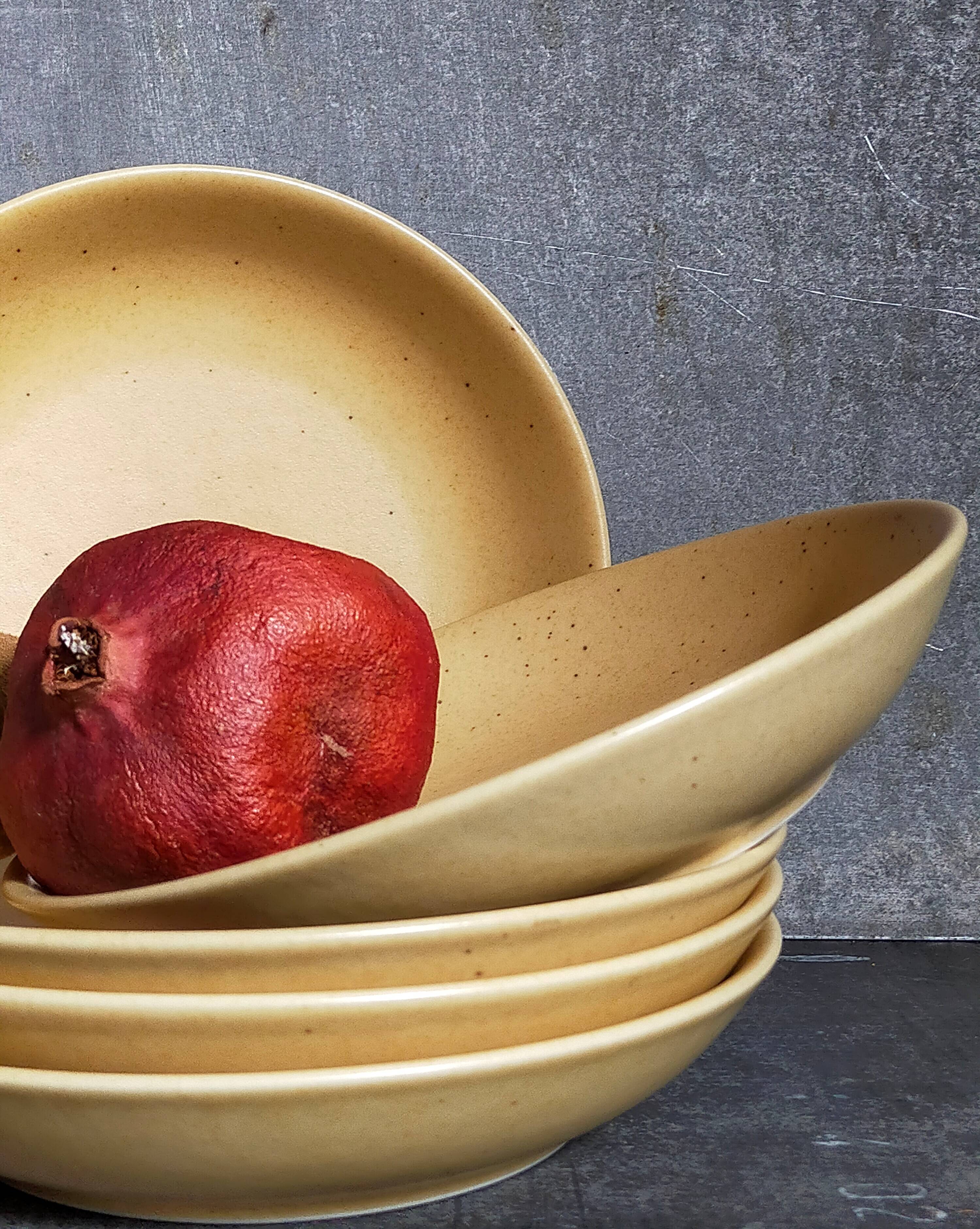 Five vintage natural stoneware soup plates