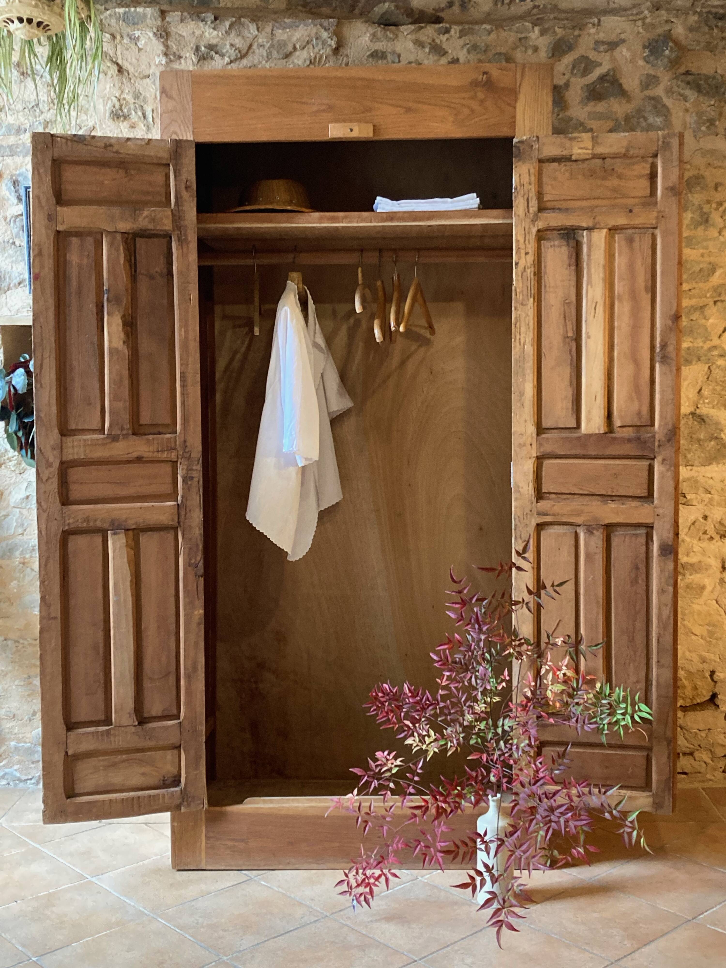 Wardrobe with exotic carved doors