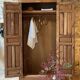 Wardrobe with exotic carved doors