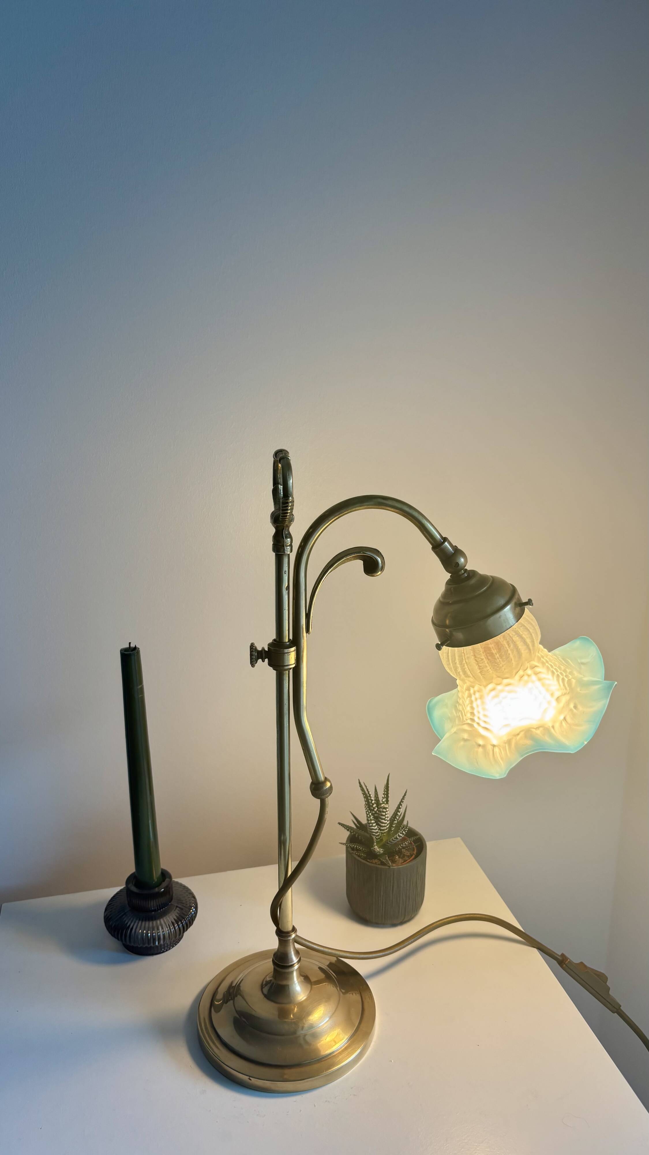 Art Nouveau style gilded brass lamp with sky blue opaline tulip