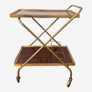 Wheeled service trolley in Formica brass structure