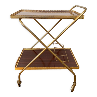 Wheeled service trolley in Formica brass structure