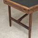 Vintage workshop folding table in oak with a hand-patinated black top.