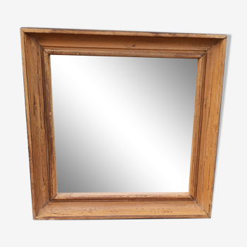 Square mirror in old wood