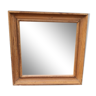 Square mirror in old wood