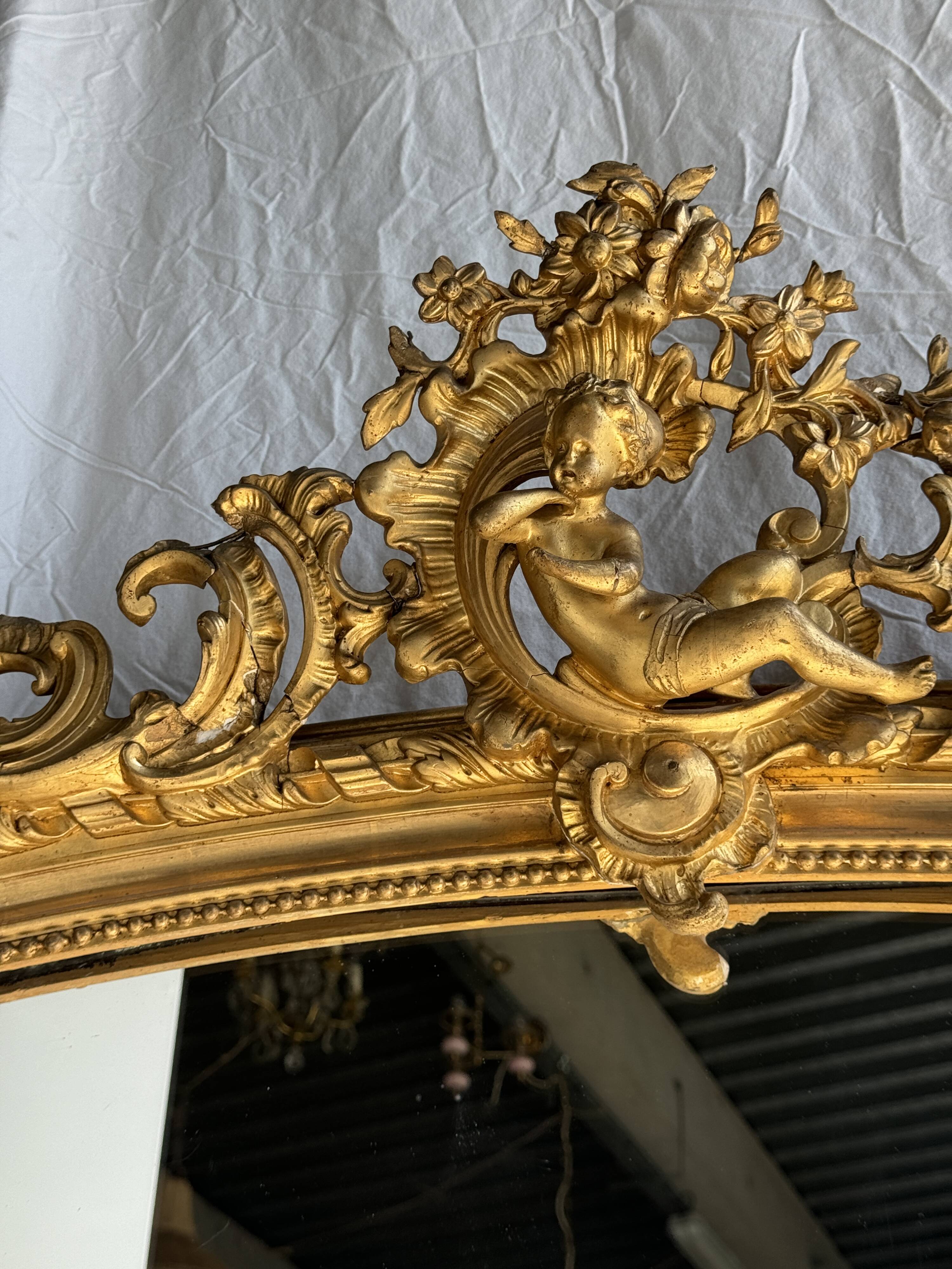 Large gilded mirror with acanthus leaf pediment H150 L98