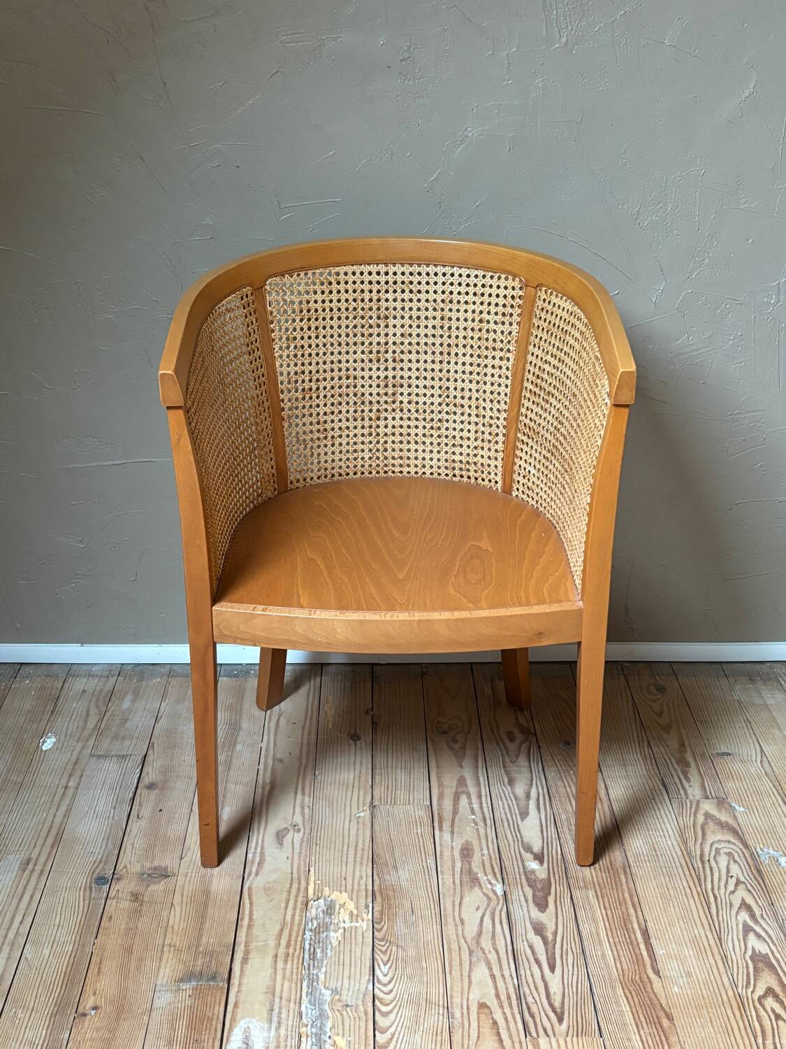 Wooden and cane cabriolet armchair