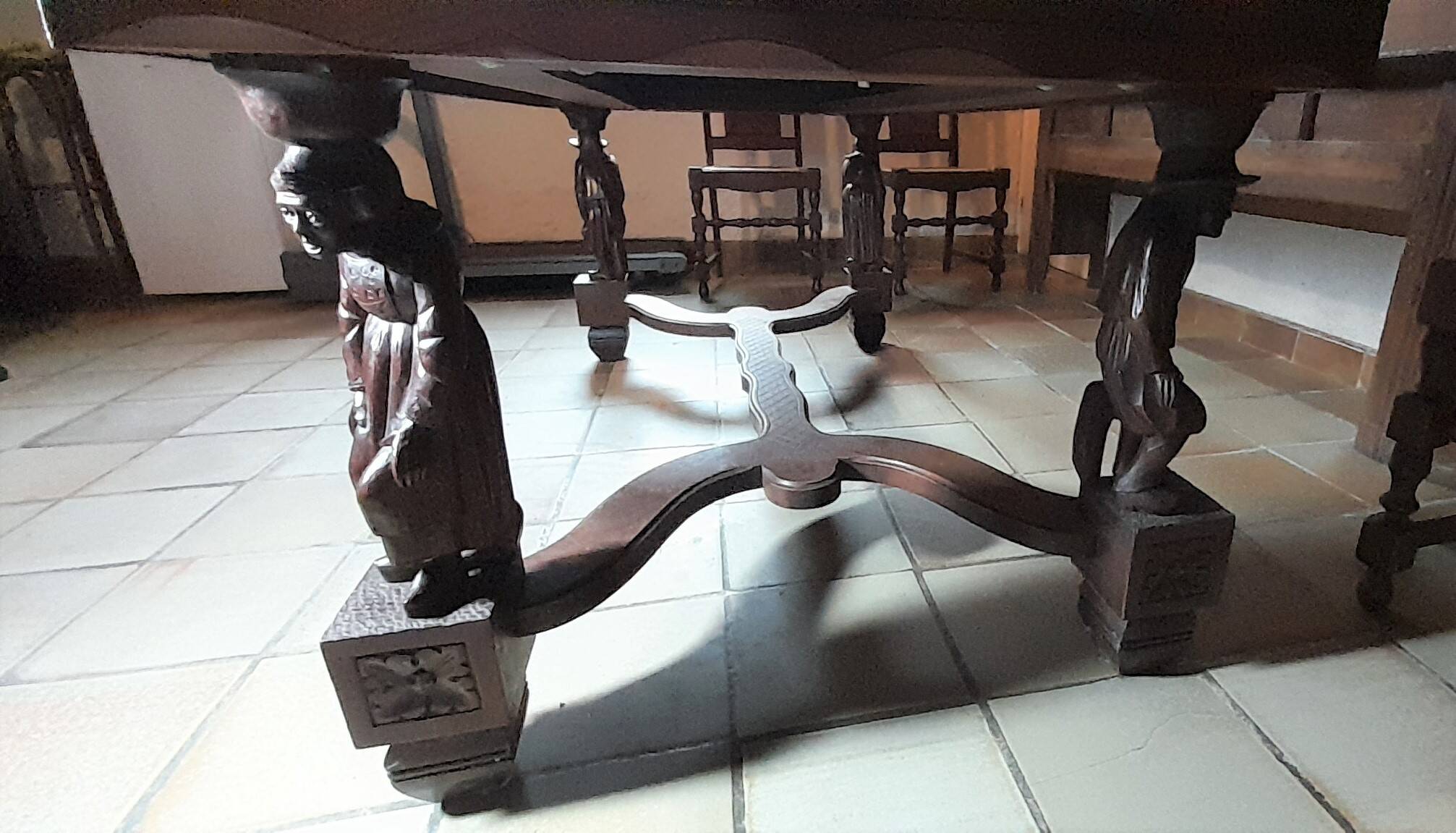 Breton dining room table with 2 extensions and 6 chairs with Breton characters