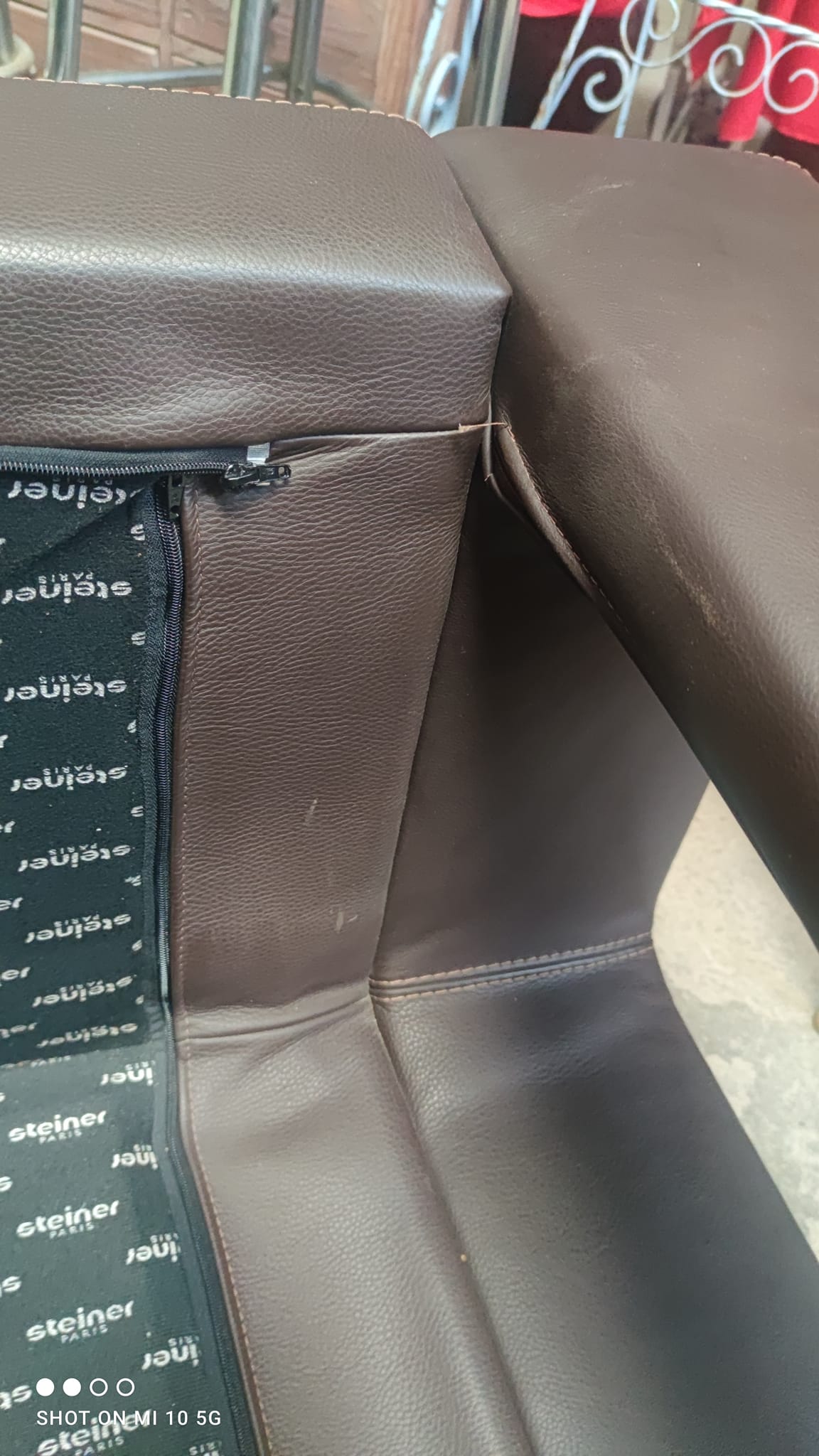 Dark brown leather armchair by Steiner, designed by Pascal Daveluy, Ranelagh model
