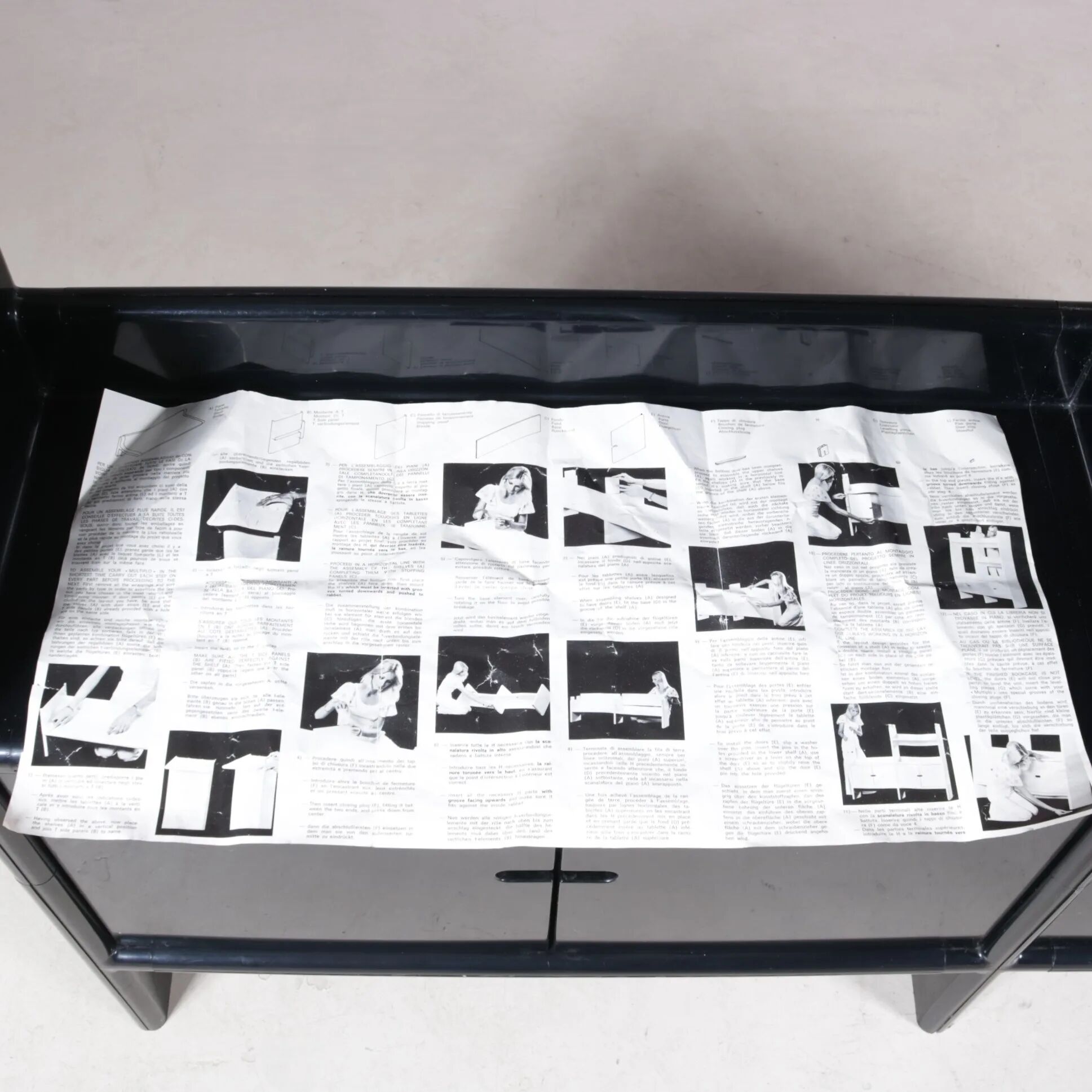 1970s low black plastic cabinet model Multiplo Harvey Guzzini Italy for Kastilia